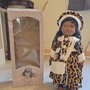 Porcelain Doll with Leopard Print Hat and Coat